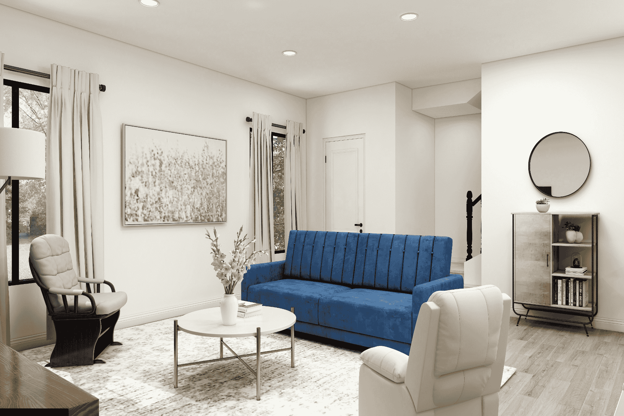 A cozy living room with a blue sofa, a round white coffee table, and an armchair. Neutral tones, abstract art, and a round mirror create a serene atmosphere.